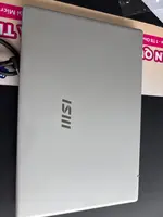 Máy tính xách tay MSI Modern 14 F13MG-027VN i5-1335U/16GB/512GB/14" IPS FHD/Win11_Bạc_Túi