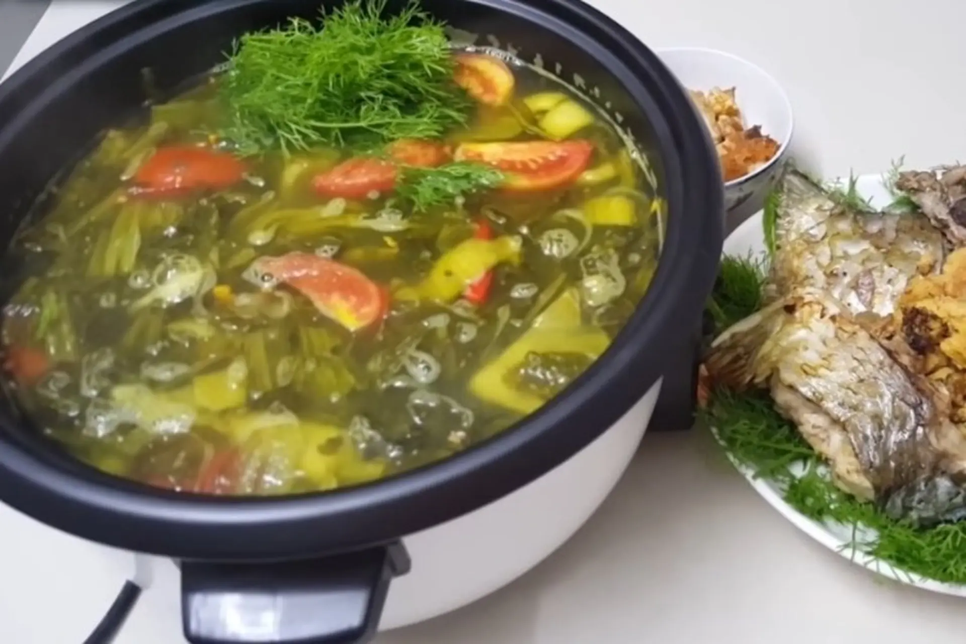 Cách làm lẩu cá chép om dưa nóng hổi thơm ngon