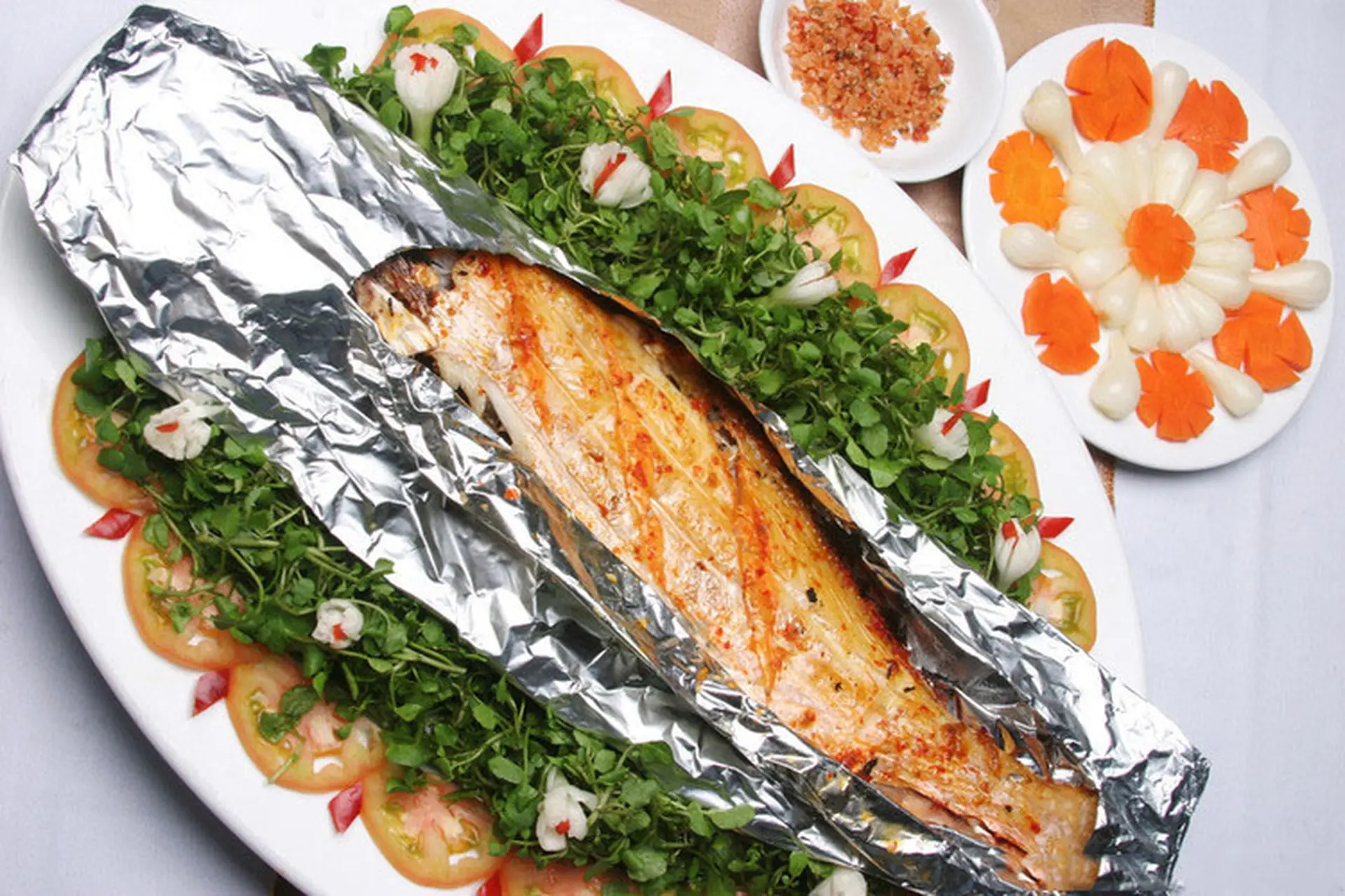 Thử ngay món cá sòng nướng giấy bạc thơm ngon, ngọt thịt để cùng nhâm nhi với bạn bè nhé