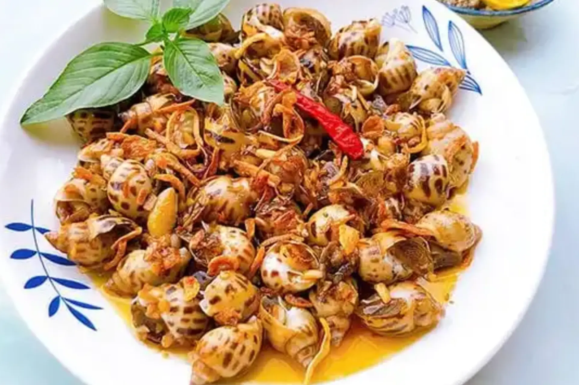 Ốc hương xào sả ớt thơm cay đúng điệu - Hướng dẫn cách làm và mẹo chọn ốc ngon chuẩn vị