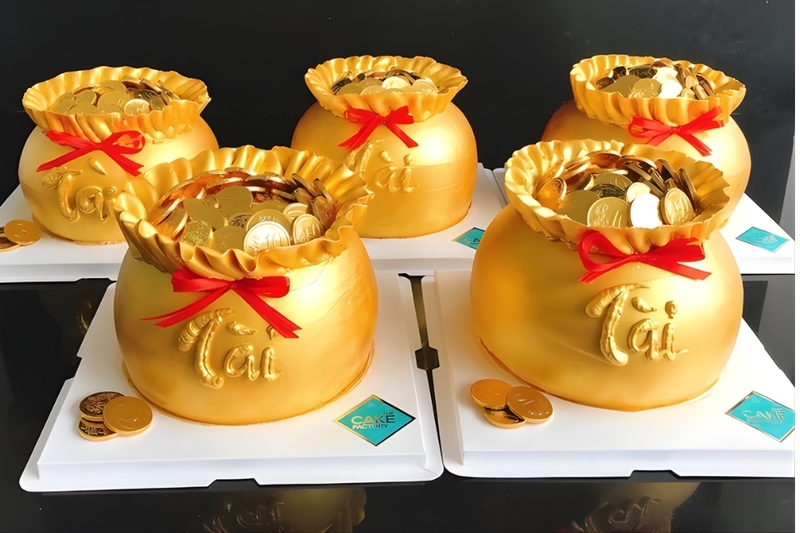 Bánh kem thần tài hình hủ vàng