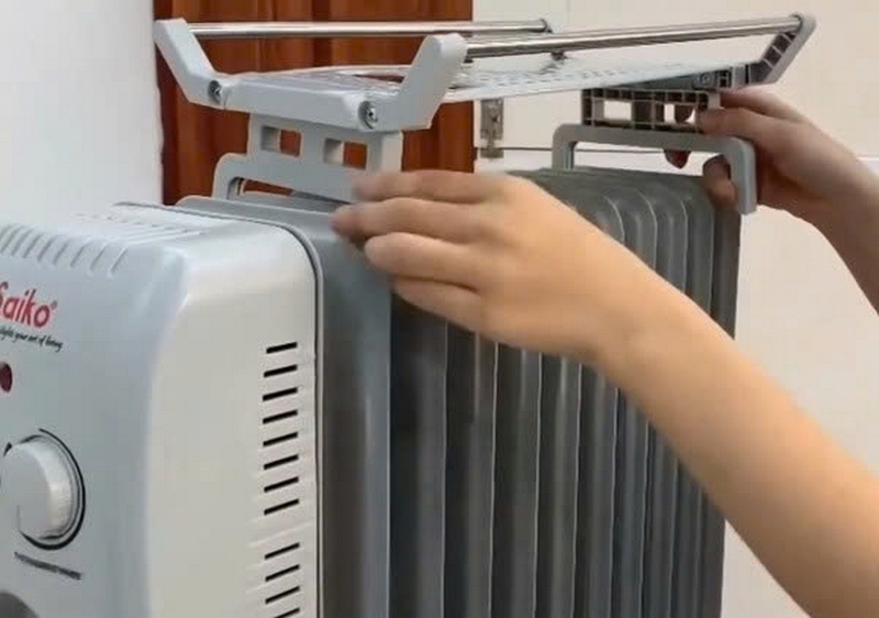 Máy sưởi dầu kêu lạch cạch ảnh 3