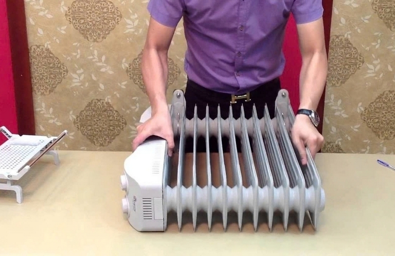 Máy sưởi dầu kêu lạch cạch ảnh 4
