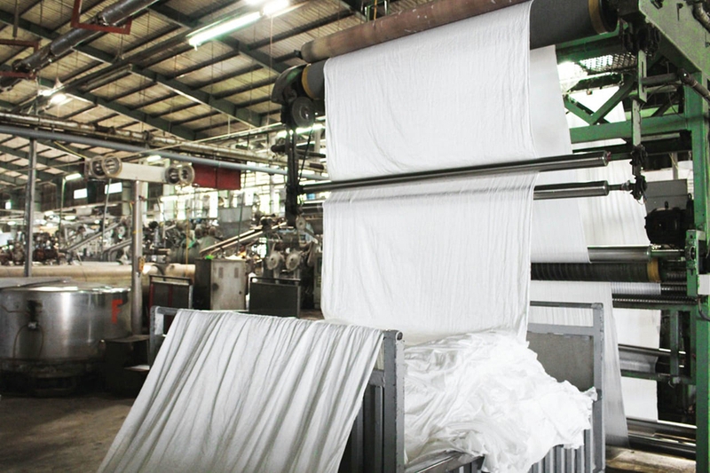 Quy trình sản xuất vải thô bao gồm các bước chính như sau