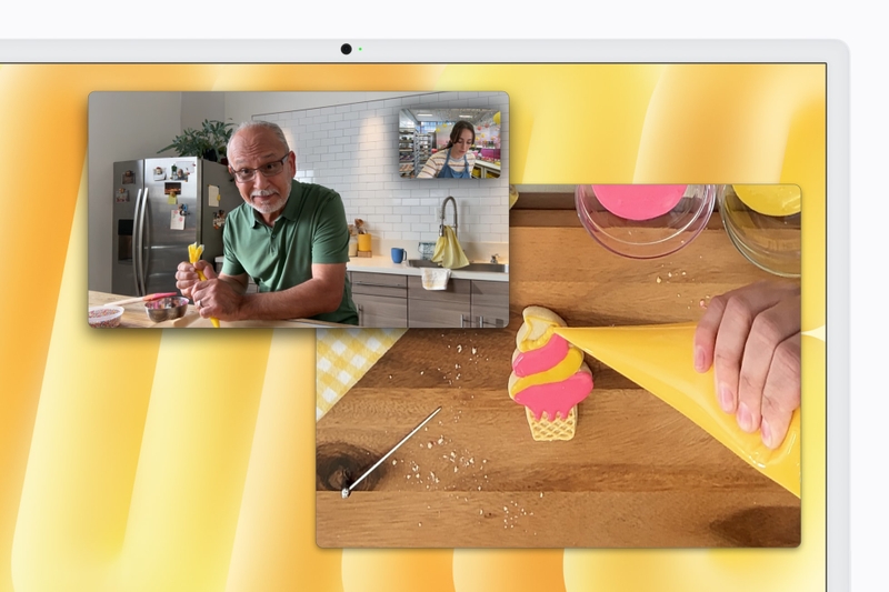 Tính năng Desk View trên iMac 24 inch M6 giúp chia sẻ góc nhìn bàn làm việc ngay trong cuộc gọi video.
