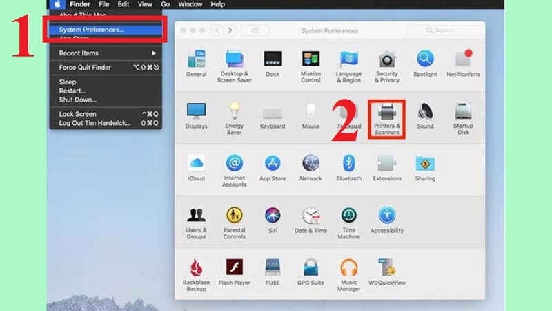 Vào mục System Preferences, chọn phần Printers & Scanners