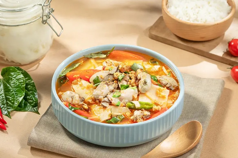 Canh hàu nấu măng chua ảnh 8