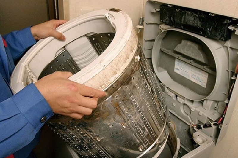 Máy giặt bị rò nước ở đáy ảnh 7