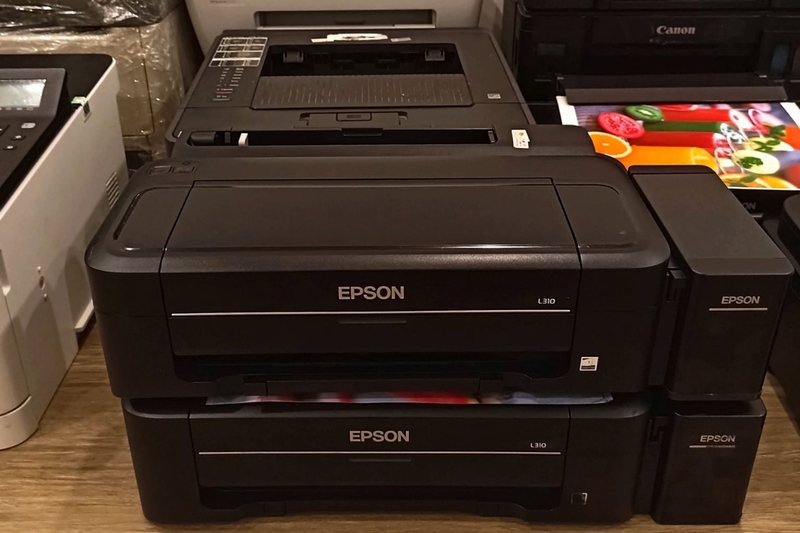 máy in Epson L310 báo lỗi kẹt giấy 9