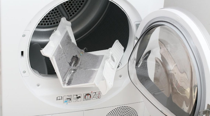 ve sinh khay loc xo vai may say