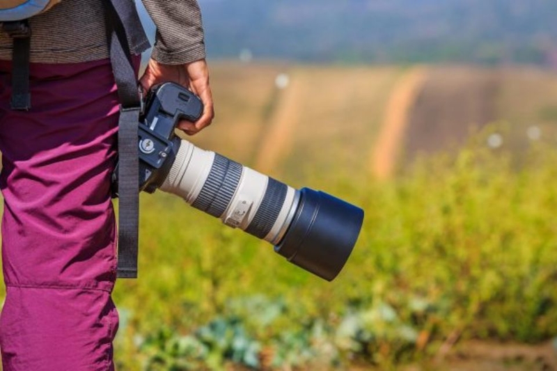 Theo chiều dài tiêu cự