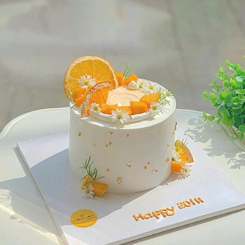 Cắt lát cam, quýt mỏng để trang trí bánh
