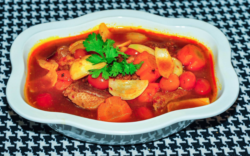 gà nấu gấc (ảnh 9)