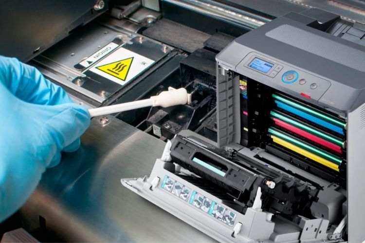 Máy in bị nhòe mực do gạt mực