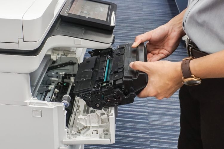 Máy in bị sọc do hỏng cụm giấy