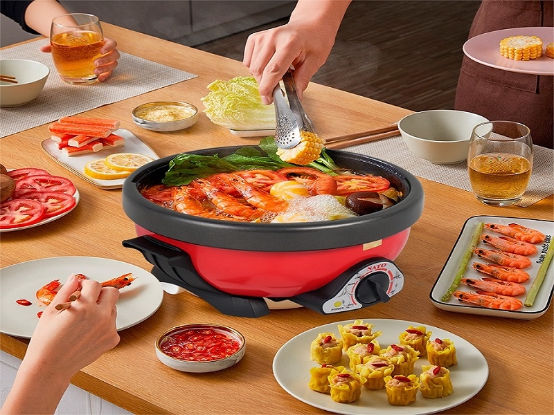 nên dùng nồi lẩu điện hay bếp từ để nấu lẩu