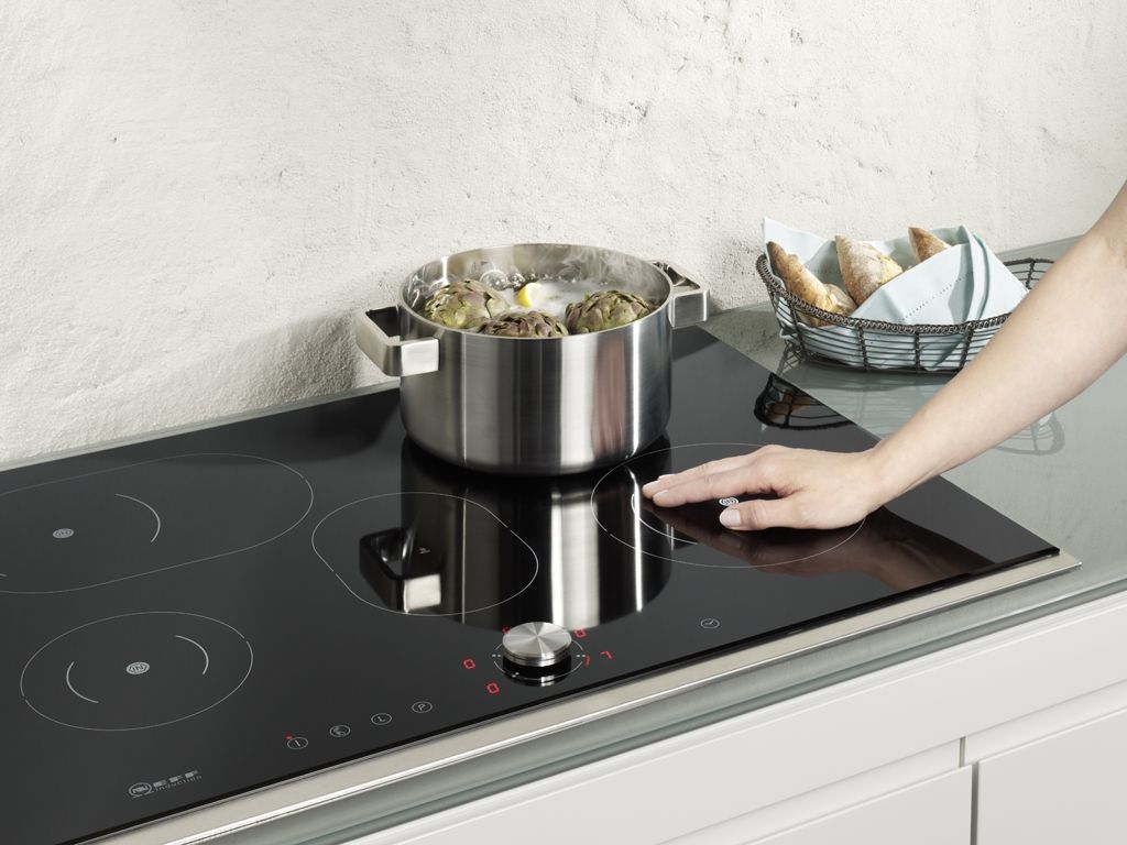 Có nên dùng miếng lót bếp từ hay không (Ảnh 4)