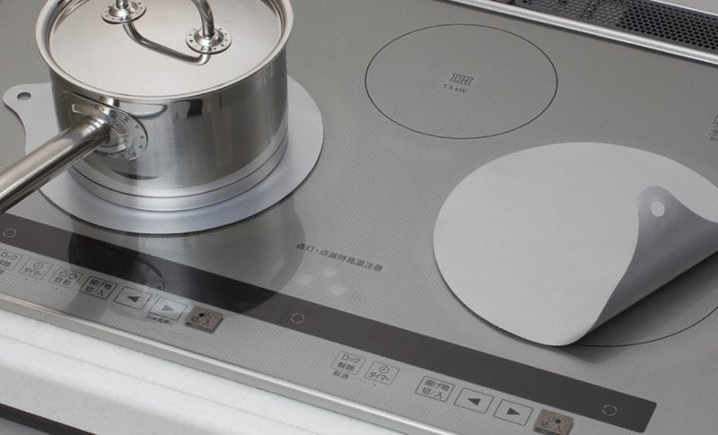 Có nên dùng miếng lót bếp từ hay không (Ảnh 1)