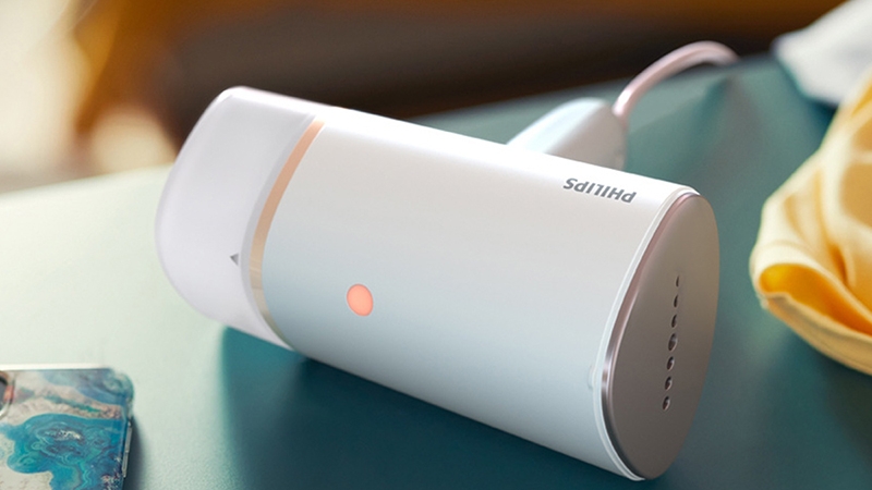 Nên mua bàn ủi hơi nước đứng hay cầm tay