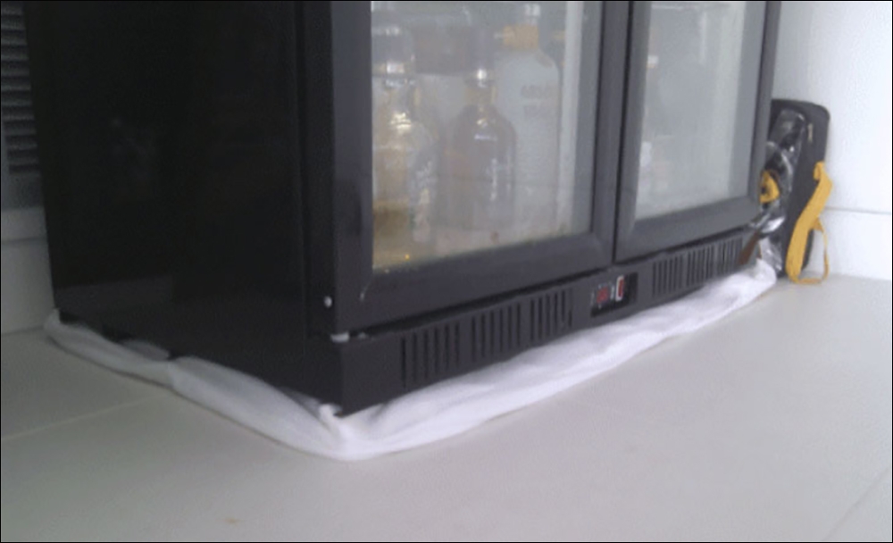 quấn vải xung quanh tủ lạnh