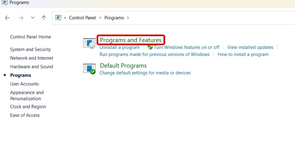 Chọn mở Programs and Features