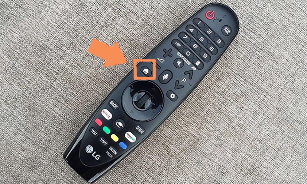 Nhấn nút home trên điều khiển tivi LG