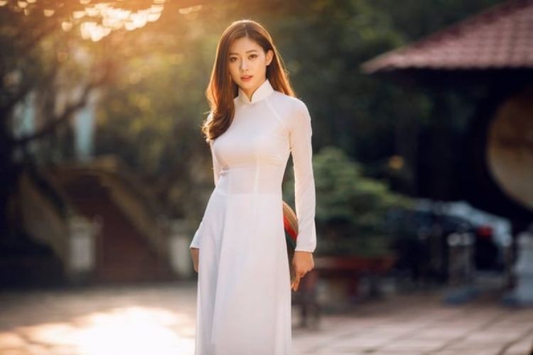 Cách tạo dáng chụp ảnh áo dài cực xinh cho nàng đẹp lung linh - Hình 3