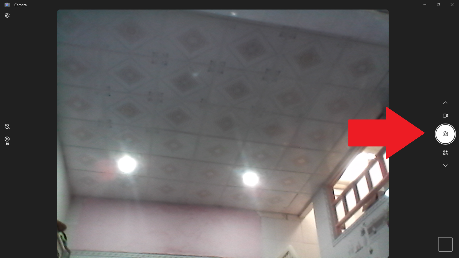 Nhấn chụp ảnh hoặc quay phim