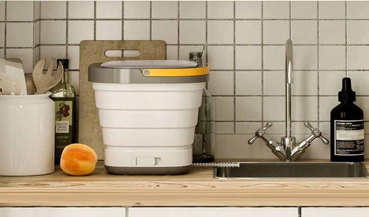 Máy giặt gấp gọn thiết kế hiện đại, góp phần tô điểm cho không gian