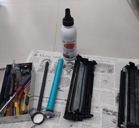 Quy trình đổ mực toner mới vào hộp mực máy in Canon