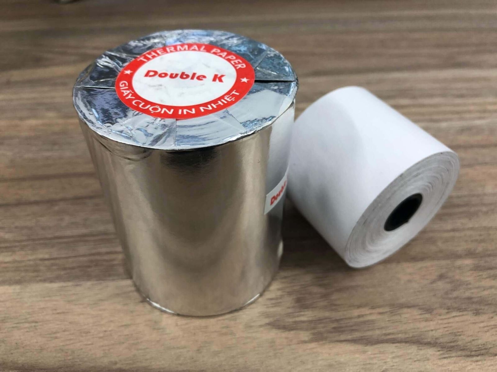 Giấy in nhiệt chất lượng kém hoặc bảo quản sai cách gây bản in mờ