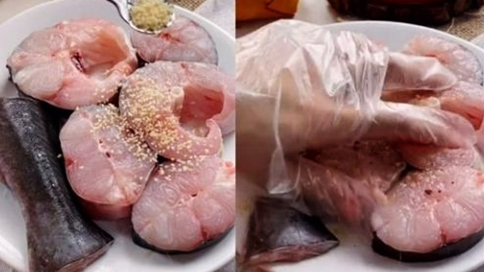 Sơ chế và ướp gia vị cá lăng.