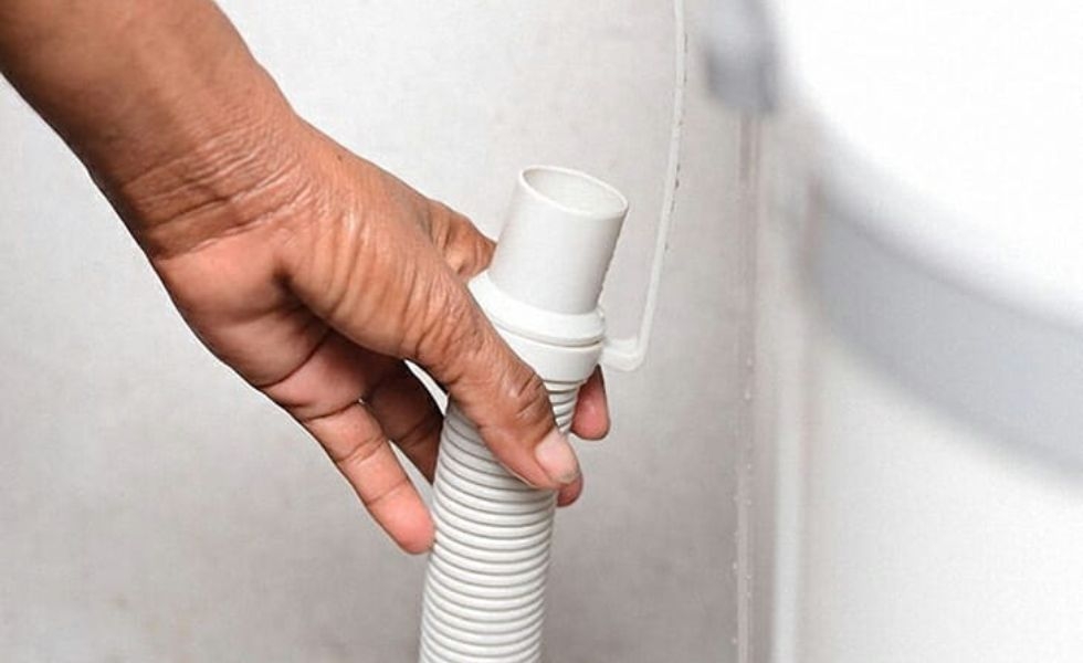 tắc ống nước máy giặt