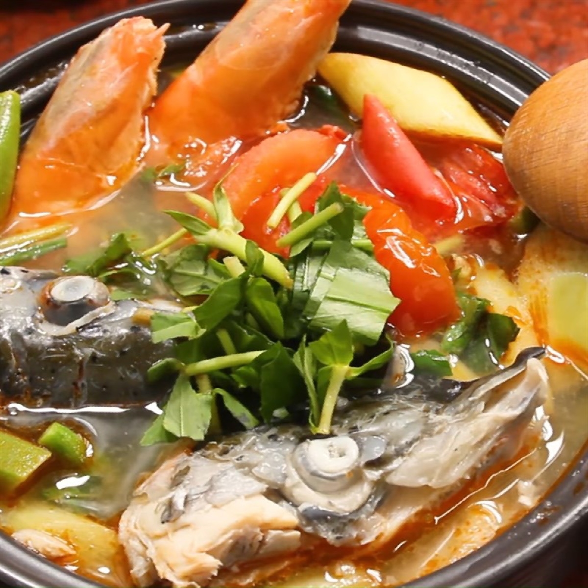 đầu cá hồi nấu canh chua - hình 5