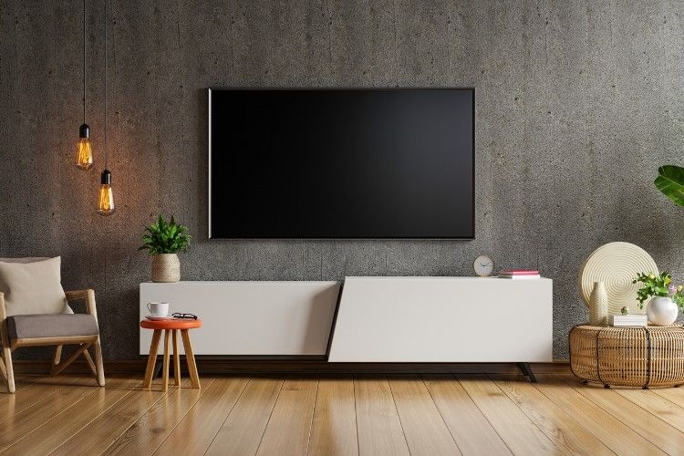 Kích thước kệ tivi treo tường phù hợp tạo sự cân đối cho căn phòng