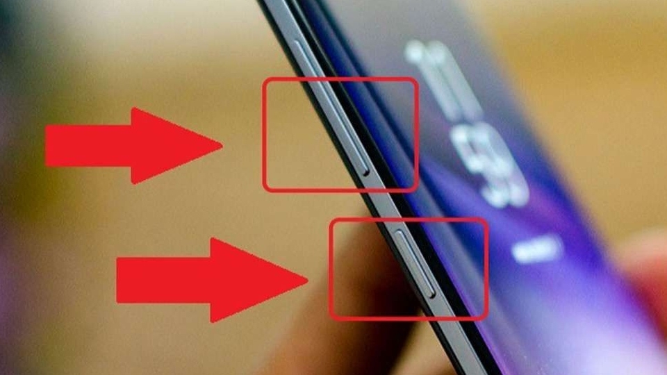 Bấm và giữ nút nguồn và nút âm lượng cùng lúc