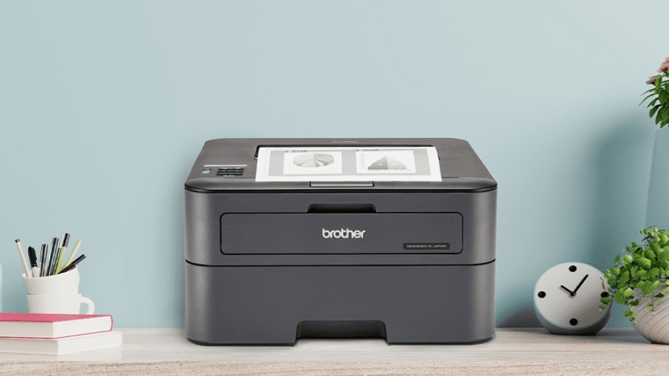 Máy Brother HL-L2321D in Laser trắng đen