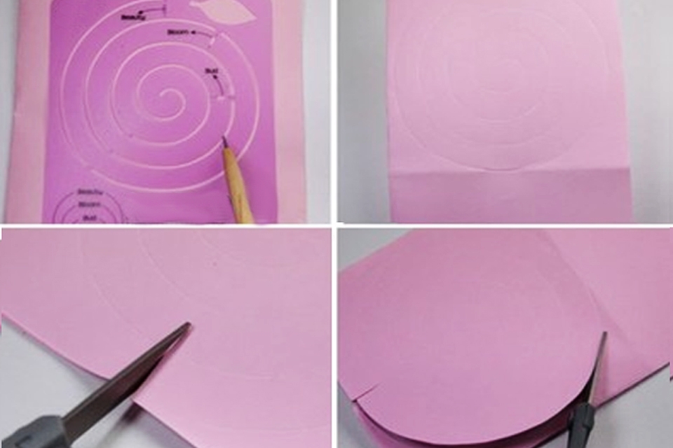 Dùng compa hay dụng cụ vẽ theo hình xoắn ốc lên trên tấm giấy bìa rồi cắt theo.