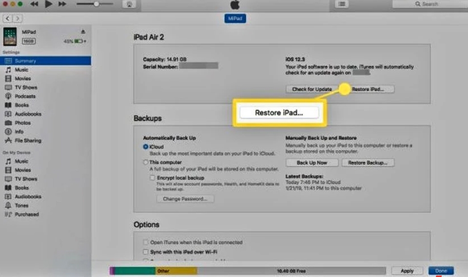 Restore iPad bằng iTunes.