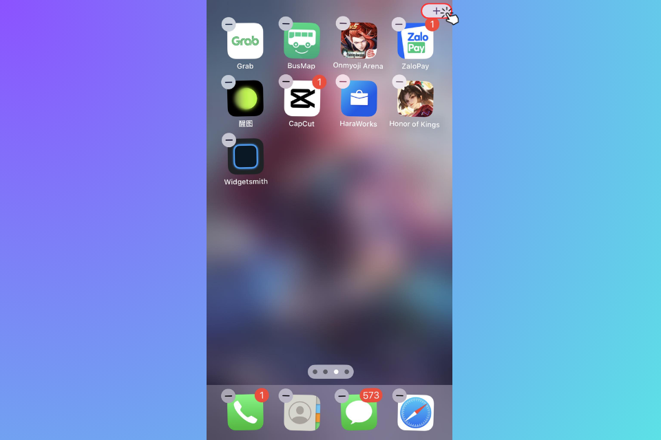 Quay trở lại màn hình chính của iPhone, nhấn giữ vào bất kỳ chỗ trống nào trên màn hình rồi nhấn vào biểu tượng dấu cộng ở phía trên bên phải màn hình