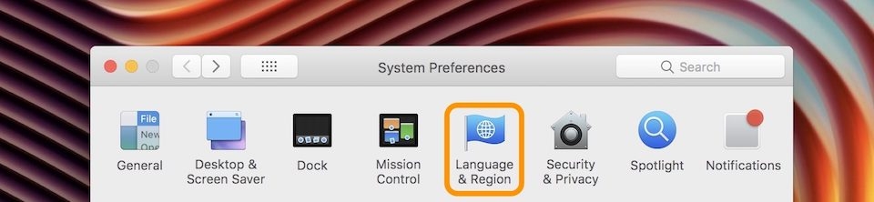 Cách thay đổi ngôn ngữ và vùng thời gian trên hệ điều hành macOS Chọn Language & Region.