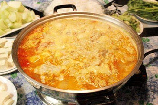 cách làm lẩu măng chua bằng bếp lẩu điện (hình 6)