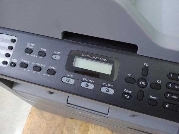 nut dieu khien tren may in brother