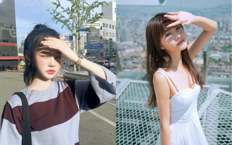 Đưa tay che ánh nắng