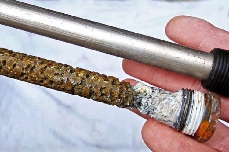 Máy lọc nước nóng lạnh có mùi khét 3