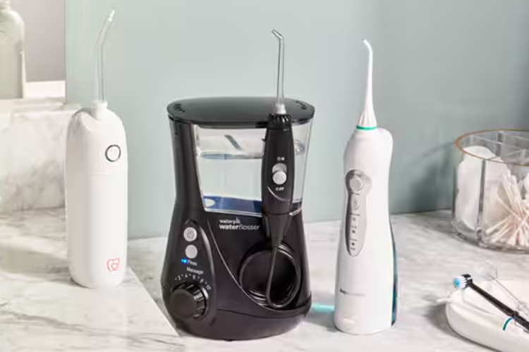 máy tăm nước dùng pin hay điện tốt hơn 7