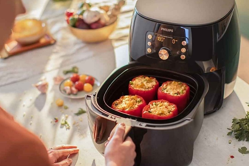 Nồi chiên không dầu đang nấu có mở ra được không ảnh 4