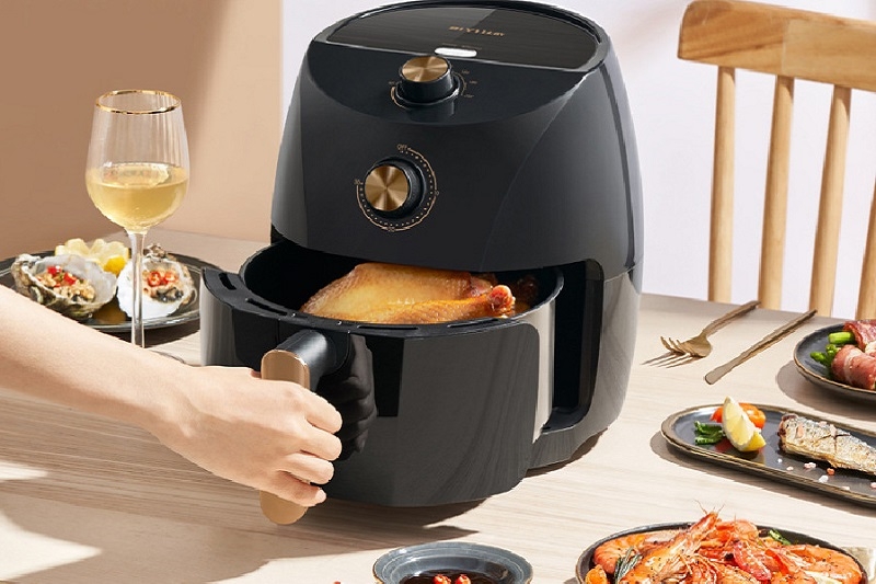 Nồi chiên không dầu đang nấu có mở ra được không ảnh 5