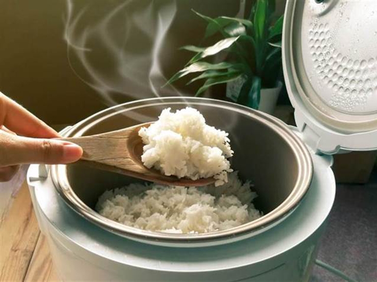 Nồi cơm điện nấu nhanh - ảnh 1