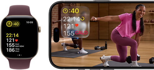 Apple Watch ở bên cạnh iPhone đang hiển thị bài tập trong Apple Fitness+
